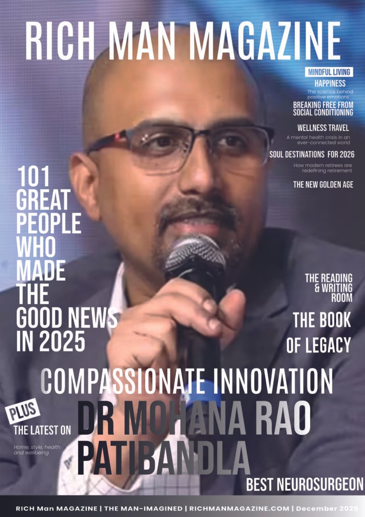 Cover of Rich Man Magazine featuring Dr. Mohana Rao Patibandla speaking into a microphone, honored for compassionate innovation in minimally invasive neurosurgery, December 2025 issue.